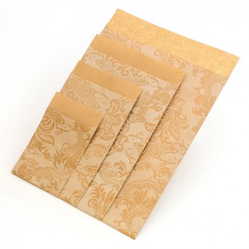  Präsent-Flachbeutel aus Papier; 9,5 x 14 + 2 cm; Design: Venezia; weiß auf naturbraun; ca. 20 mm; Kraftpapier braun, enggerippt; ca. 60 g/qm 