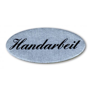  Haftetiketten; oval,  ca. 29 x 13 mm; schwarze Schrift auf silber-matt; Silberfolie; permanent haftend; Text: 