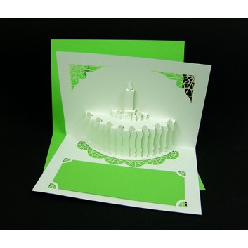  Glückwunschkarte mit Laserstanzung; 105 x 148 mm; ohne Text; Geburtstagstorte, grün hinterlegt; Ku: weiß, naßklebend, Spitzklappe 